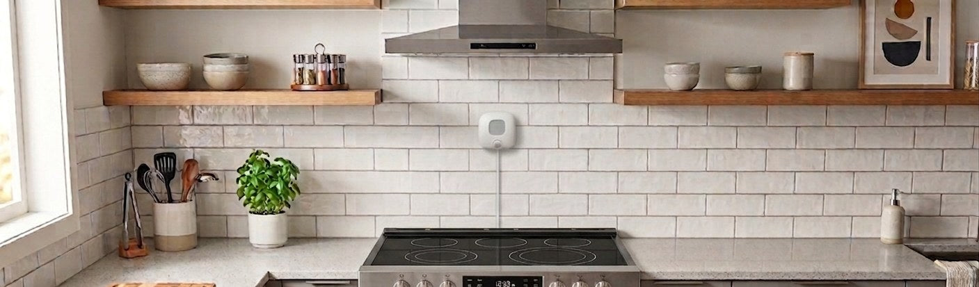 Modern kitchen with the CTS Smart Kitchen Sensor mounted above the stove